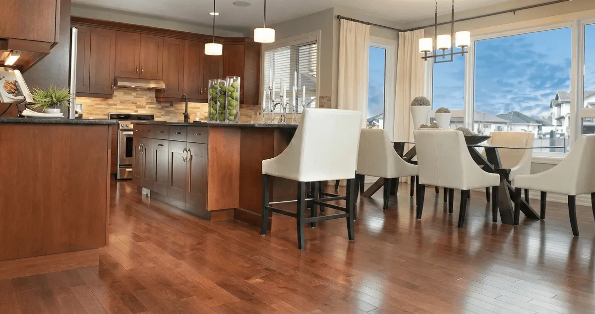 A modern kitchen with professionally installed wood flooring in Mesa, AZ